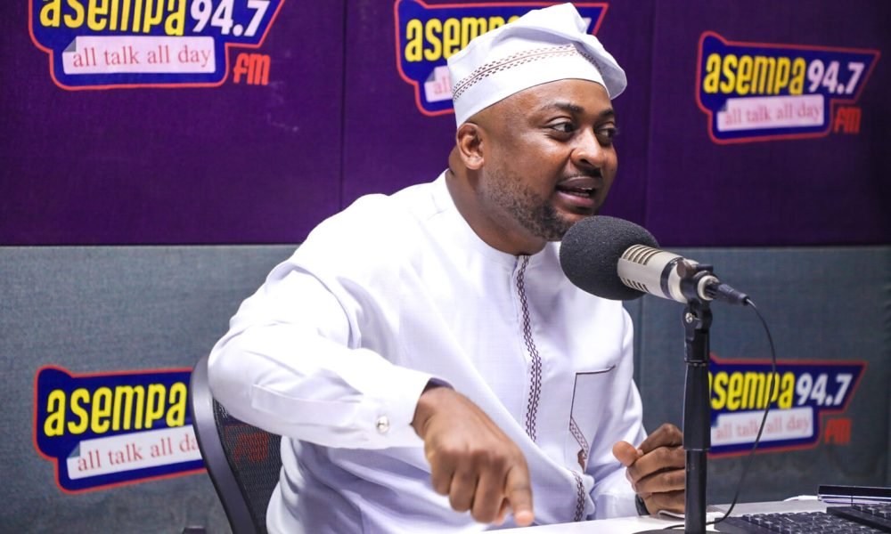 Ghanaian Parliament member speaking at a press conference