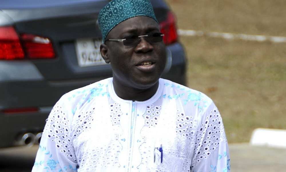 Inusah Fuseini speaking at a press conference.