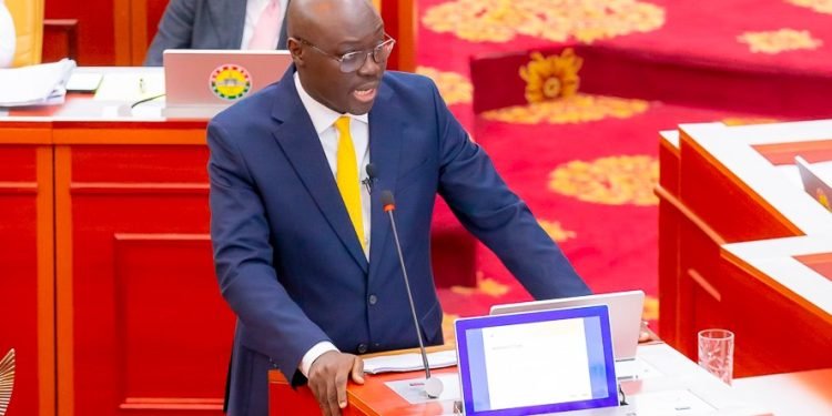 Ghanaian flag waving in front of a modern cityscape