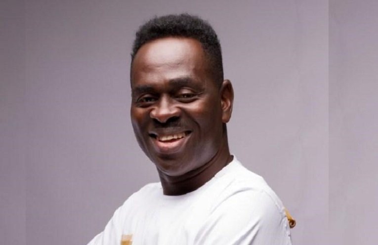 Yaw Sarpong performing on stage.