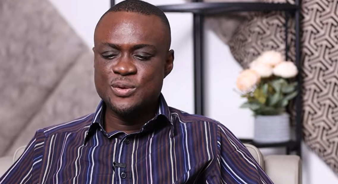 Students collaborating and reading together in a classroom setting.