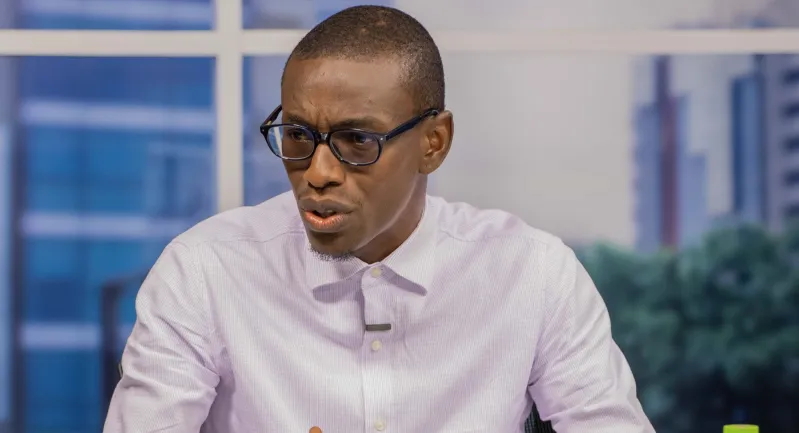 Yaw Siki pictured in a moment of prayer and reflection