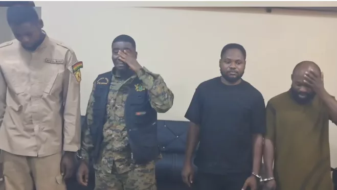 Reagan Amponsah Asare in handcuffs looking emotional during arrest