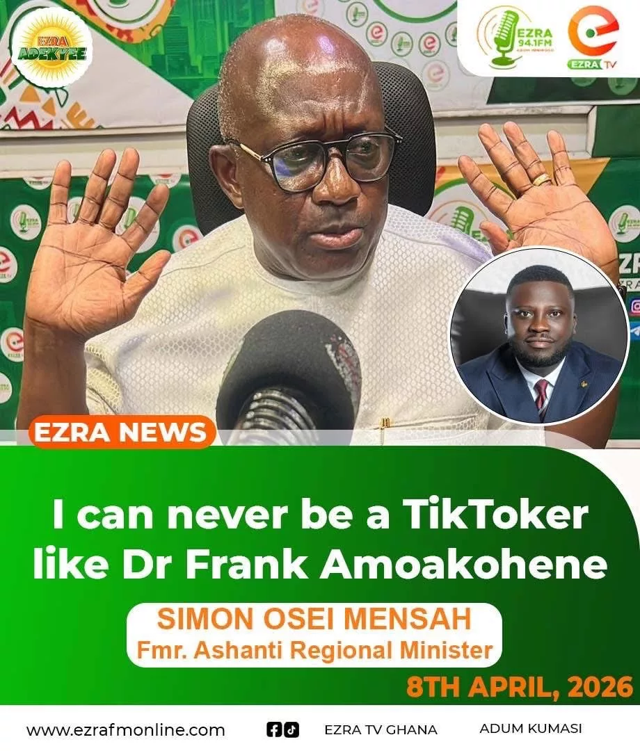 Dr. Frank Amoakohene looking at a smartphone