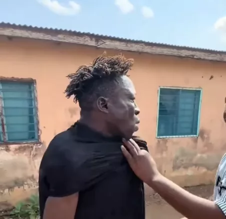 A depiction of a confrontation between a car owner and a suspect in a public area