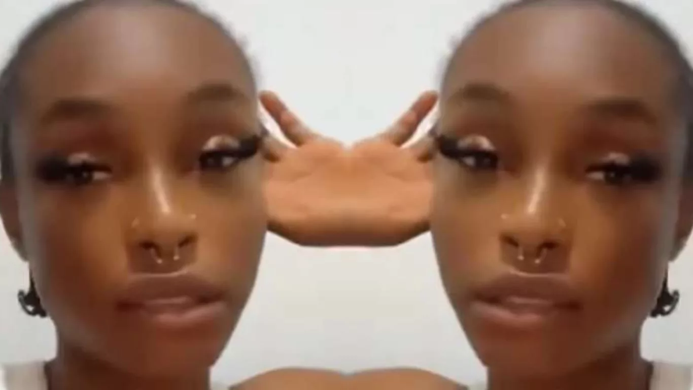 A woman recording a video for social media on her smartphone