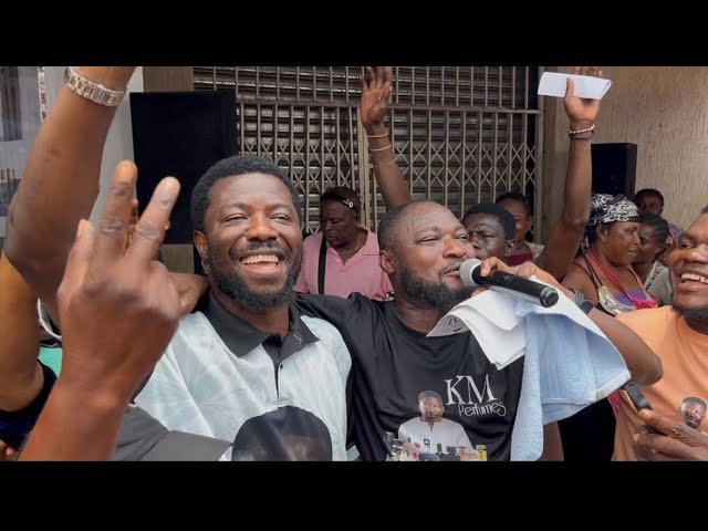 Kwaku Manu and Funny Face smiling at the KM Perfumes opening event in Madina
