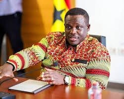 Ghanaian tech professionals collaborating on AI projects in a modern workspace