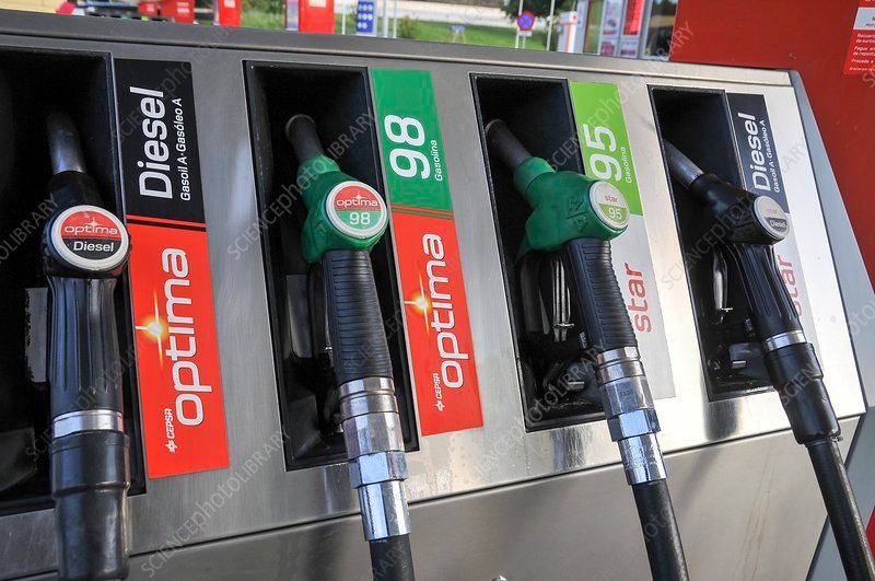 A Metro Mass Transit bus driving through a busy city street