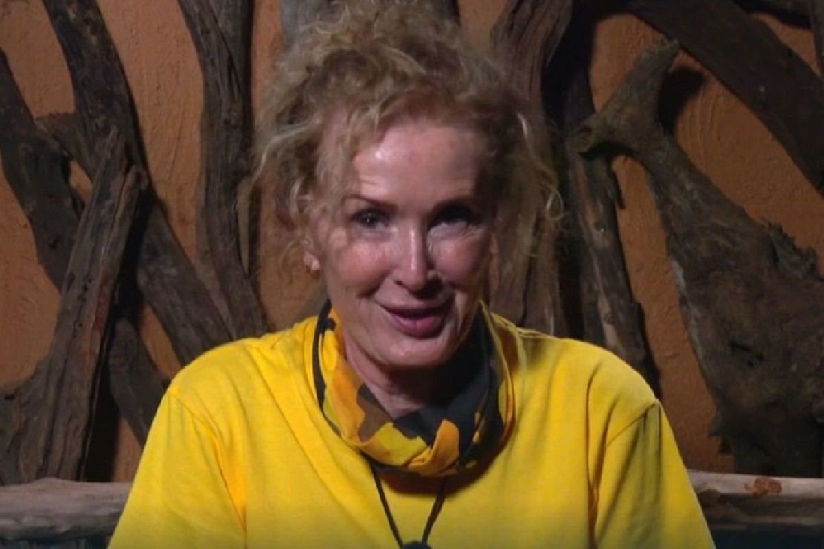 Beverley Callard and Adam Thomas strapped together during a jungle puzzle challenge