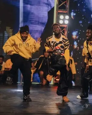 A professional portrait of Daniel Asiedu, known as Dannygfc, the Ghanaian dancer