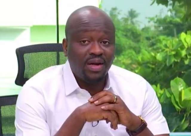 Government officials meeting around a large wooden table