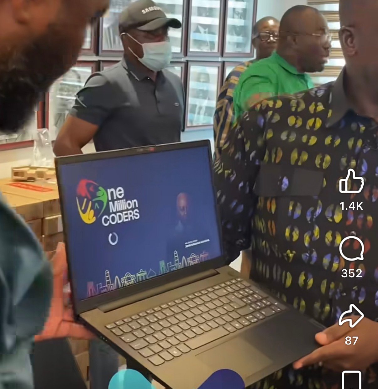 Minister Sam George presenting the laptops for the one million coders programme