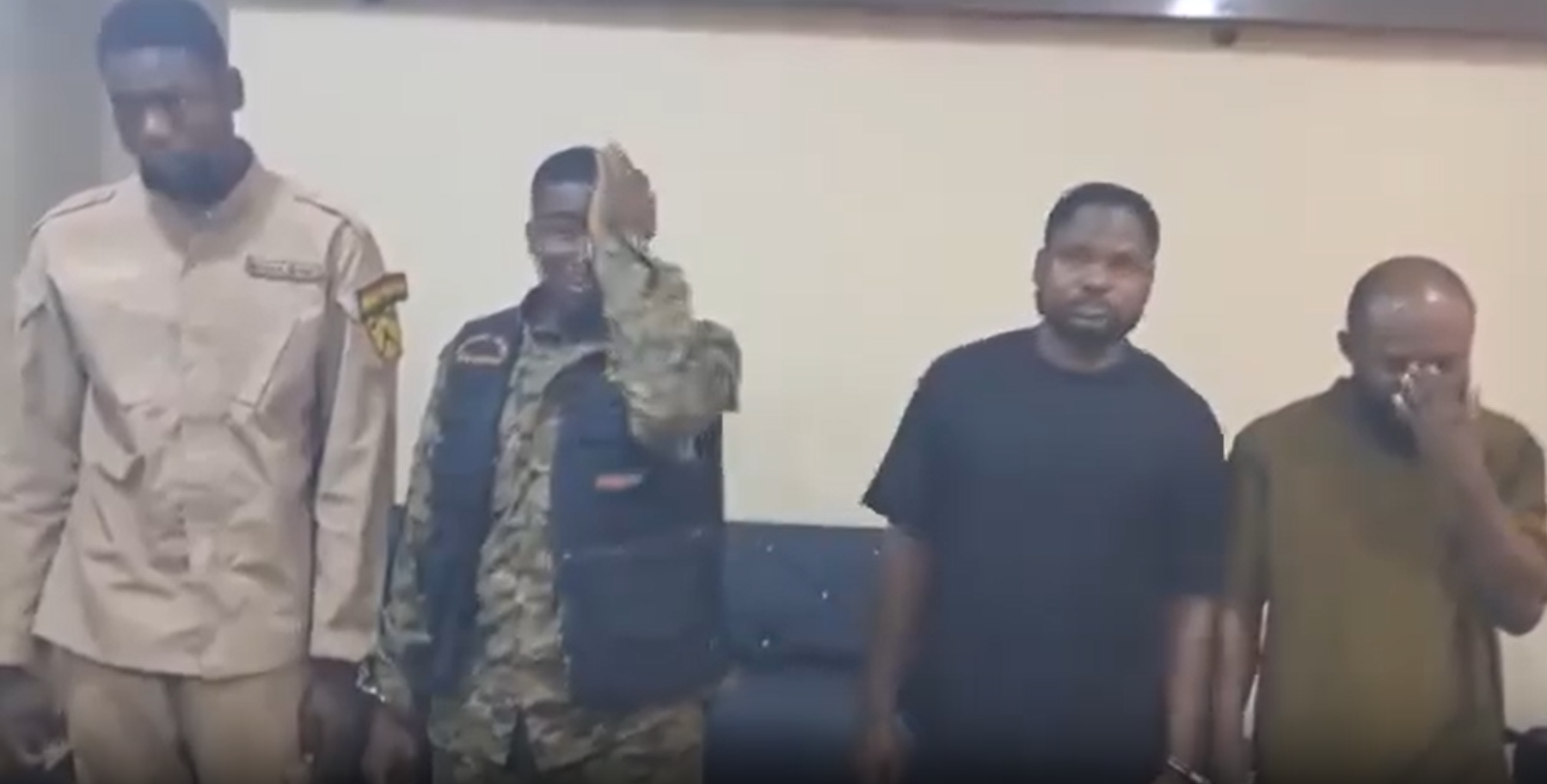 Police officers conducting an arrest in the Western North Region