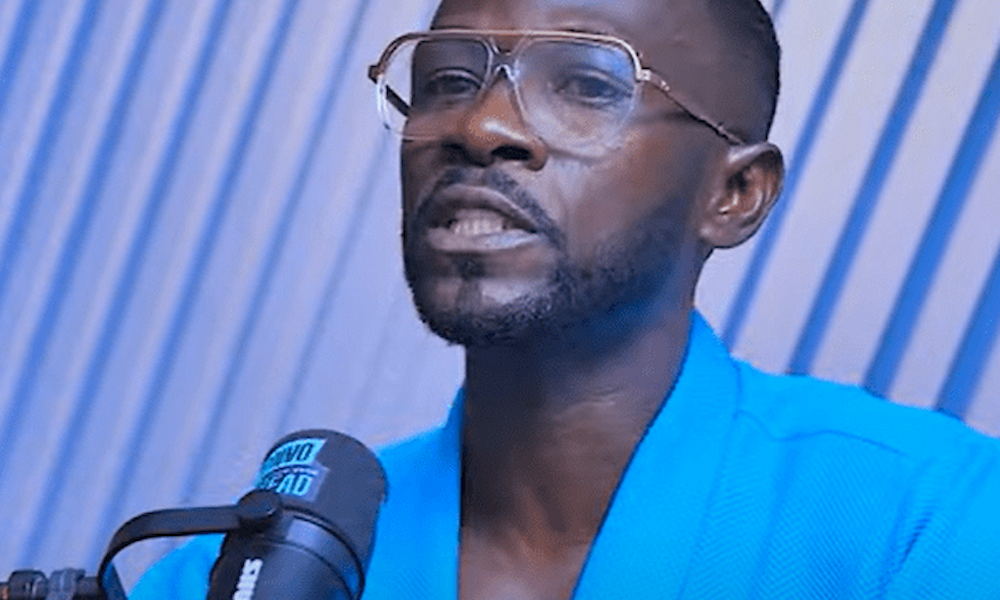 Portrait of Ghanaian rapper Okyeame Kwame smiling warmly