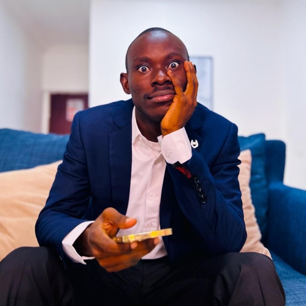 A professional portrait of GehGeh, the relationship and financial expert